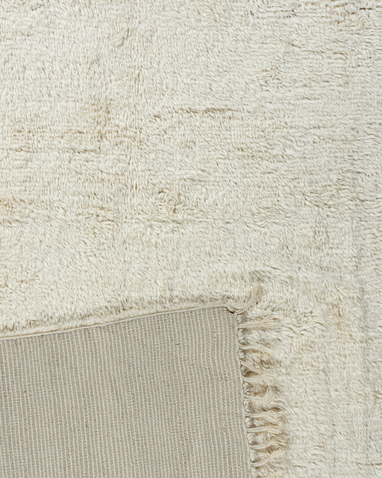 WAHO_IMAGE::n-3943-moroccan-fluffy-solid-ivory-rug-8.10x11.10-13157.jpg