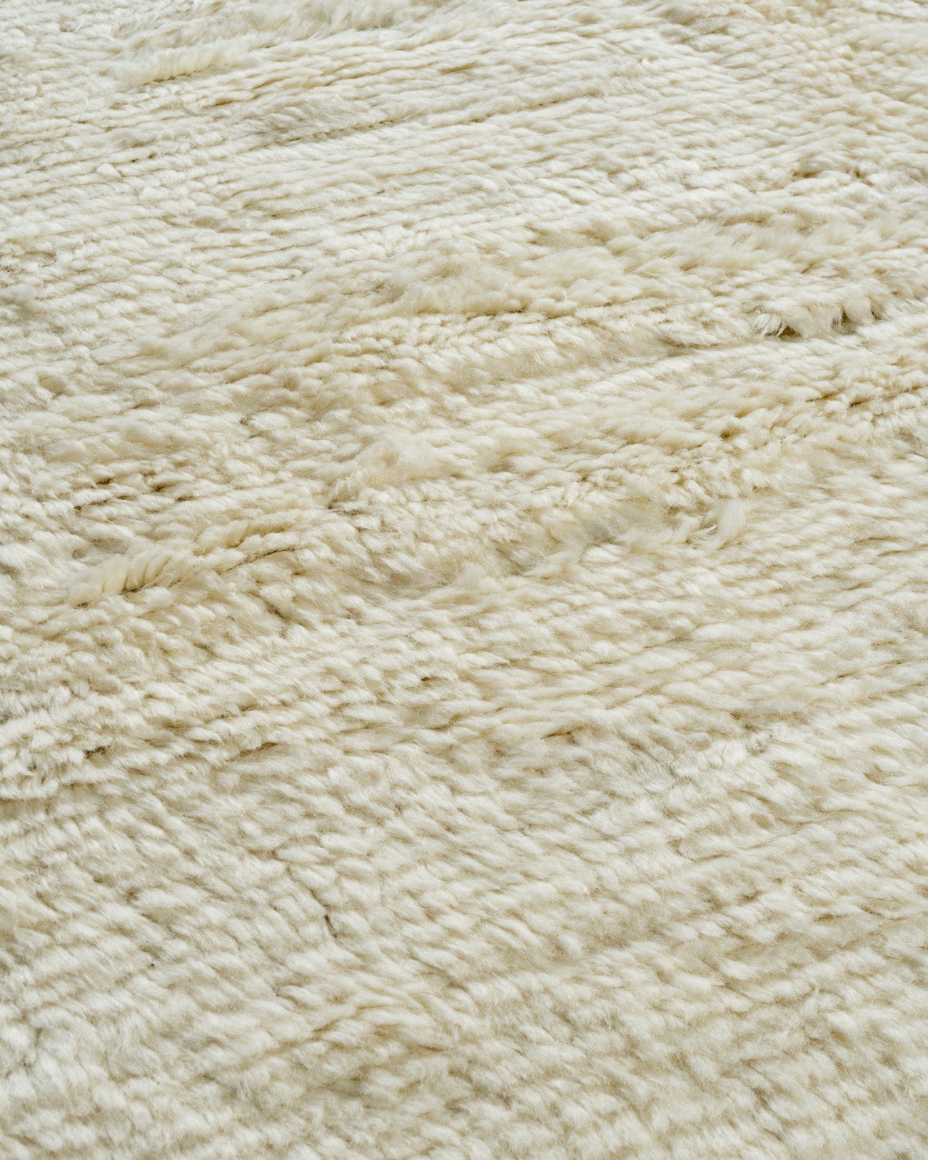 WAHO_IMAGE::n-3943-moroccan-fluffy-solid-ivory-rug-8.10x11.10-13158.jpg
